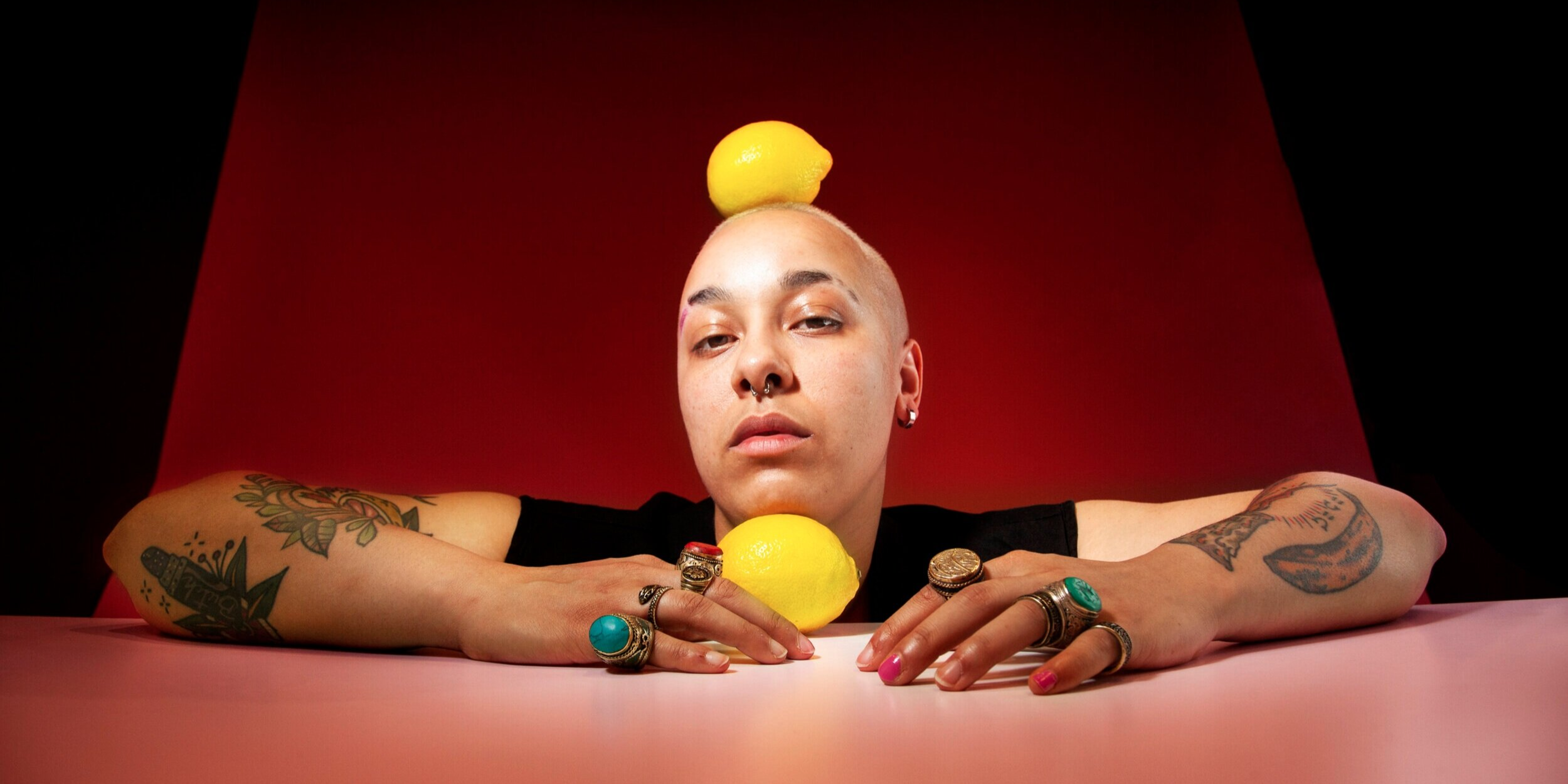 Mika Onyx Johnson poses with a lemon in a promotional shot for Pink Lemonade